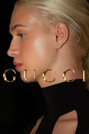 Close-up of a woman's profile with Gucci logo overlay.